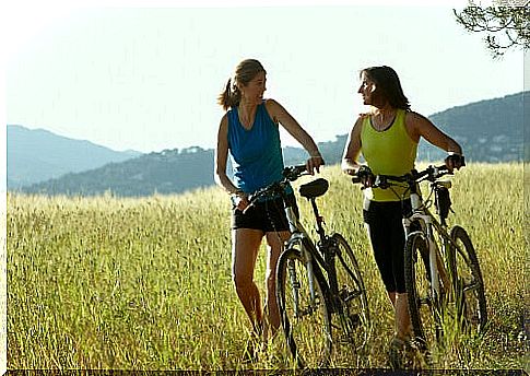 Two women cycling