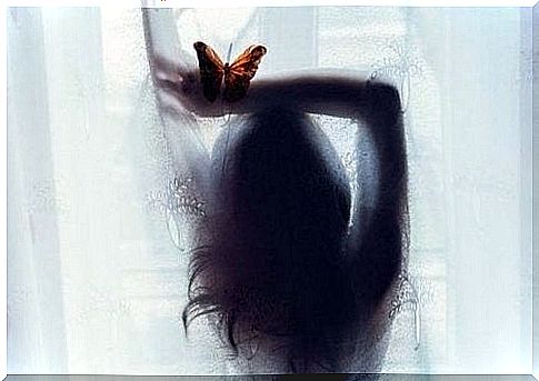 woman-with-butterfly-caresses-her-soul