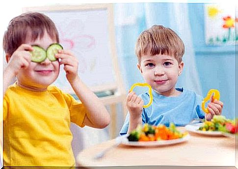 Children play with food